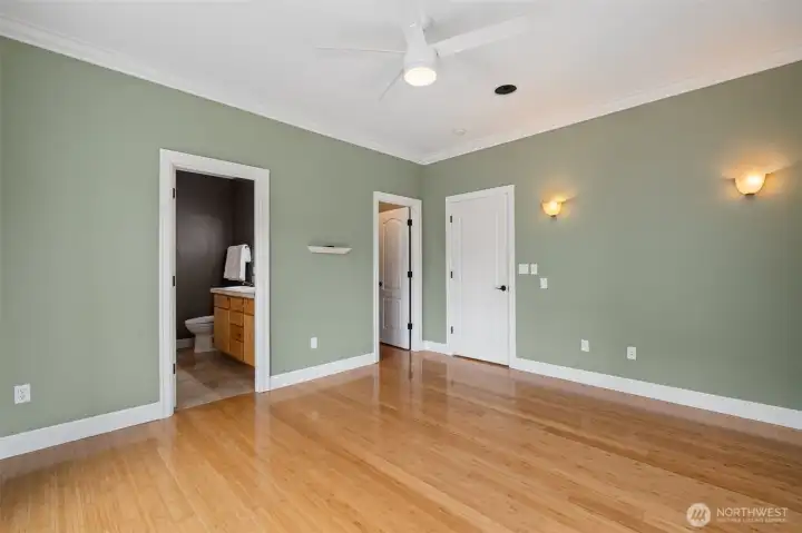 Primary Bedroom with bamboo flooring and attached bathroom