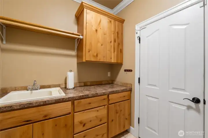 Utility room with lots of storage and sink