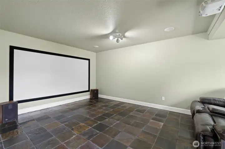 Theater room/4th bedroom with slate floors