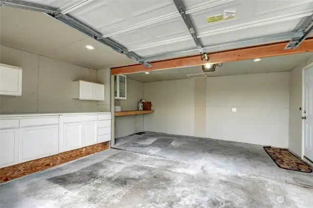 Oversized garage with shop area or use for additional storage.
