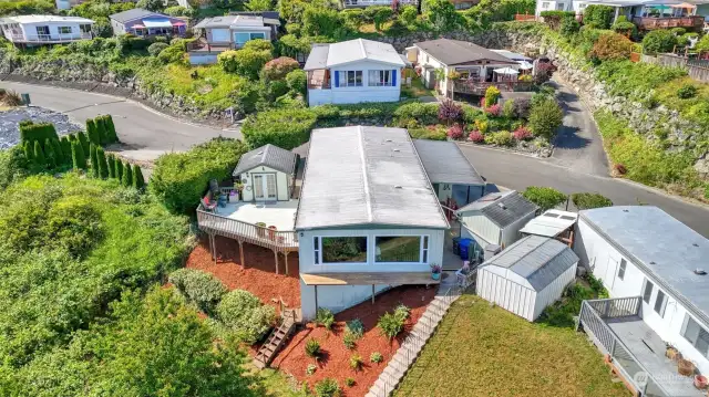 Aerial view of home looking at the back side.