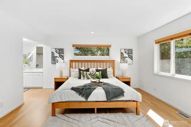 Primary with ensuite bath and walk-in closet.