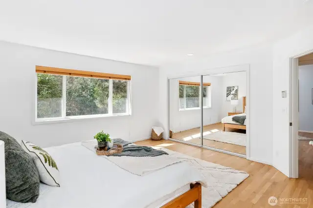 Ample closet space in primary bedroom.