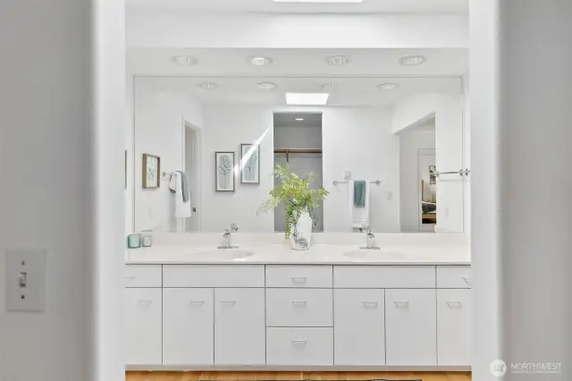 Primary bath double sink vanity with new faucets.