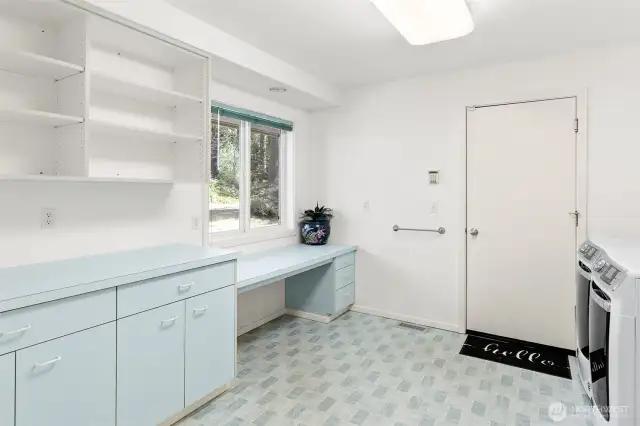 Ample storage in the laundry room.