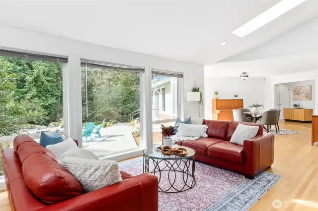 Great room has large picture windows looking onto the private courtyard as well as 2 large skylights with remote controlled blinds.