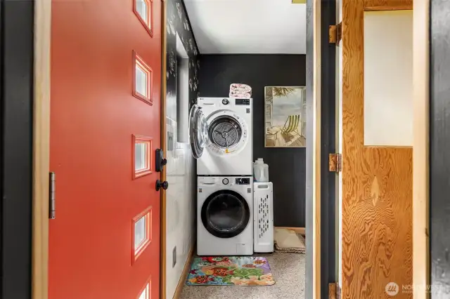 Laundry area. Door to right leads to boathouse in basement.