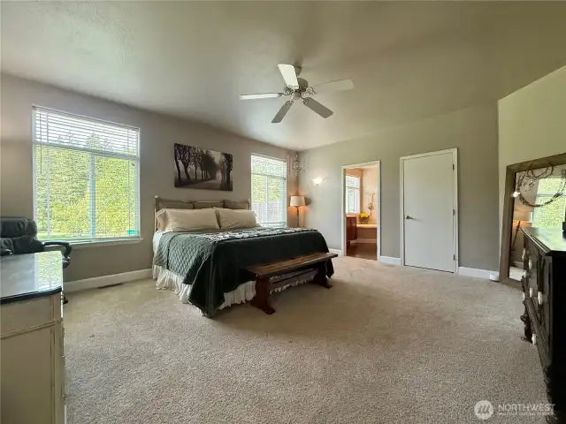 Grand primary bedroom is spacious and sunny. Plenty of room for even the largest bedroom furnishings.