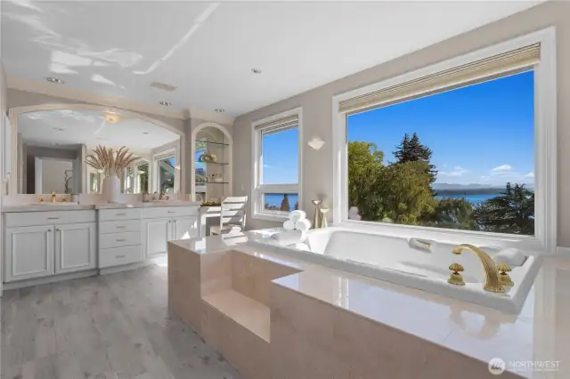 Primary bathroom with gorgeous views of the lake and Mt. Rainier.