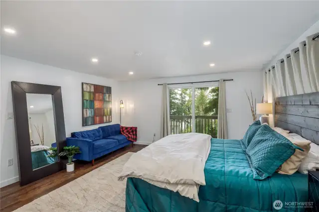 King size primary bedroom with walk-in closet.
