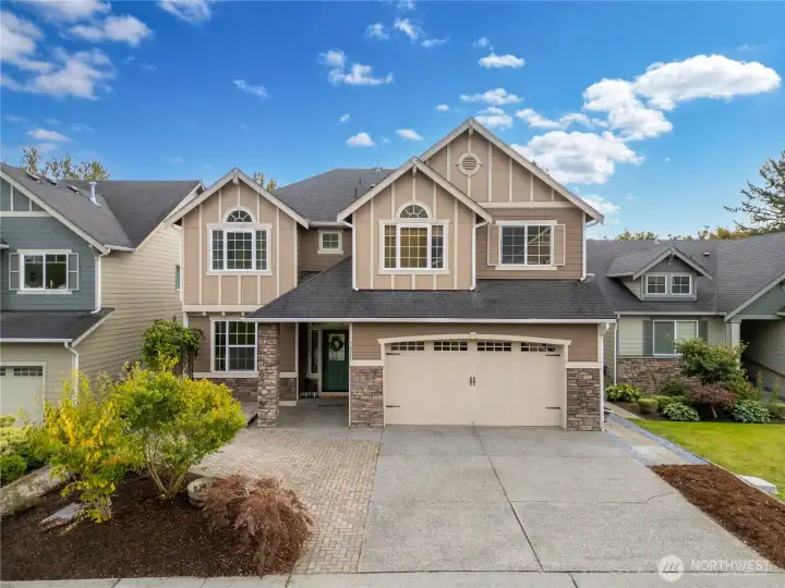 3 car tandem garage, extra added cobblestone parking.