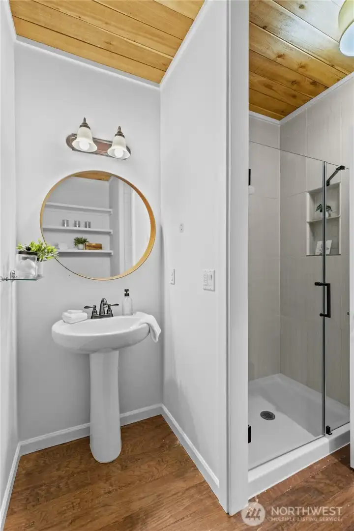 Upgraded: shower added (formally coat closet) to accommodate bedroom on the main floor.