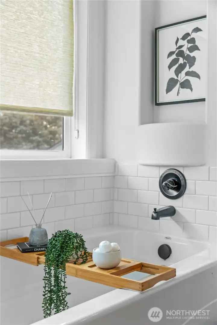 Upgrade large soaking tub in primary bathroom.