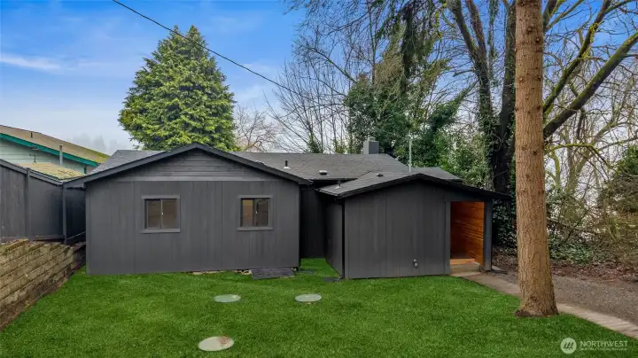 Front photo (Photo enhanced to illustrate potential landscaping)