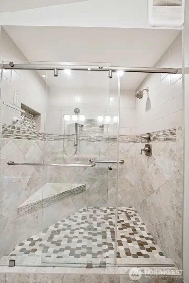 Look at this amazing shower in the primary bath!