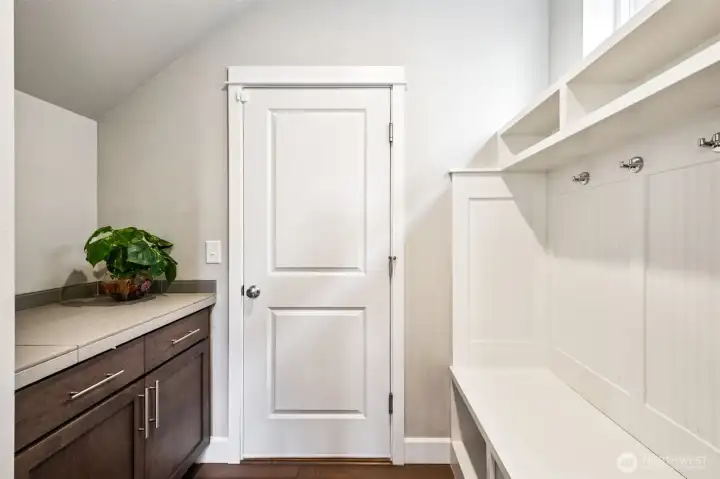 Functional mudroom area with built-in storage to keep everything organized!