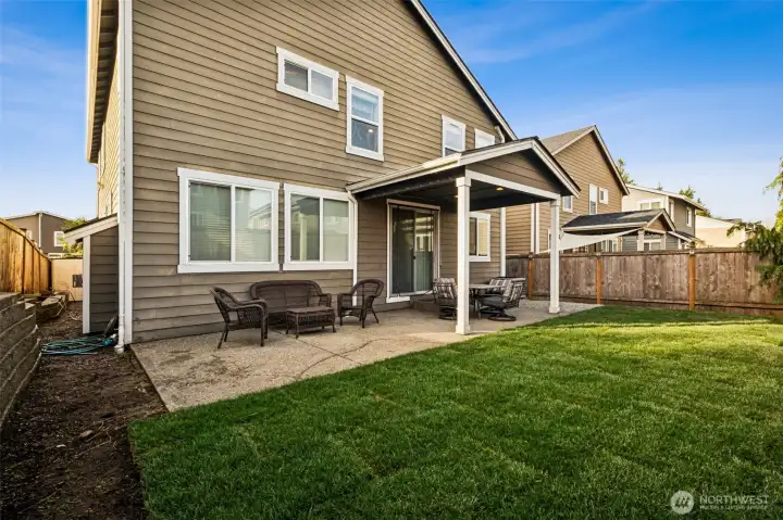 Private, fully fenced backyard with plenty of room to relax, play, or garden.