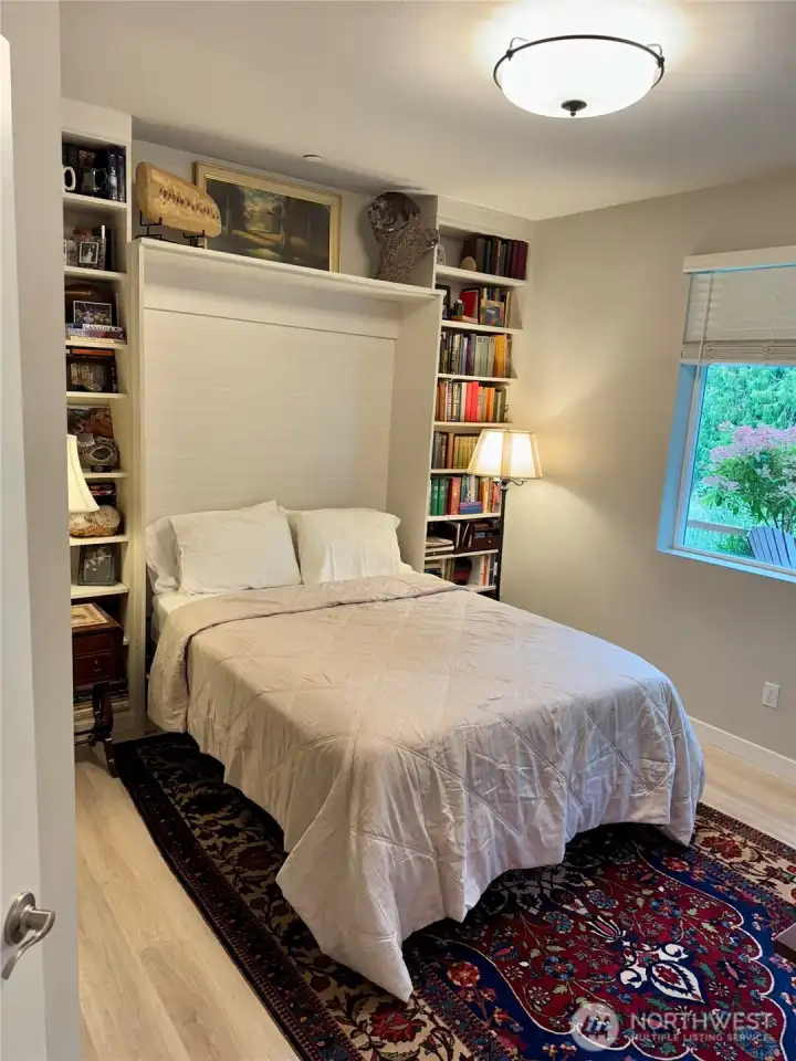 Custom high end Murphy bed stays with home.