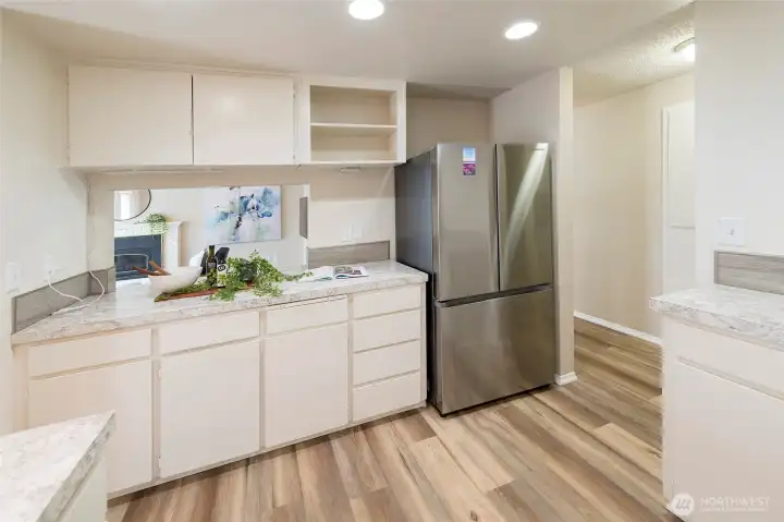 Full-height backsplash and ample cabinetry blend style and function.