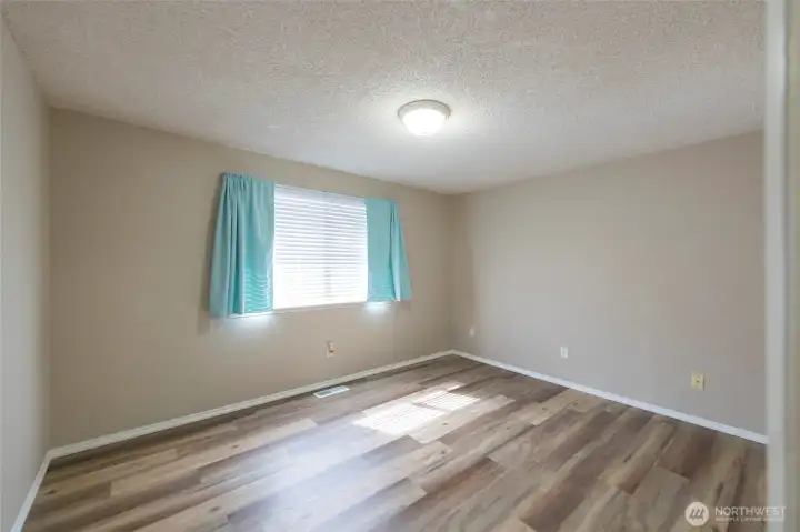 This bedroom makes a great flex space or hobby room.