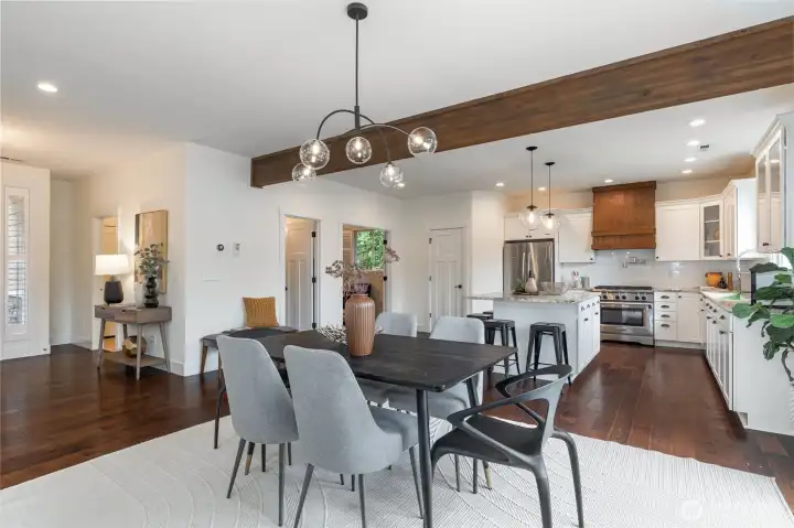 The inviting great room showcases a two-chef granite kitchen, cozy gas fireplace