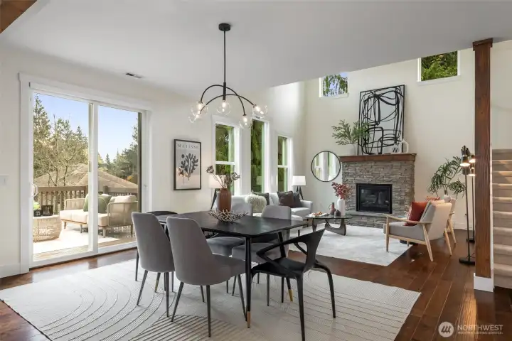walls of windows framing serene lake and territorial park views