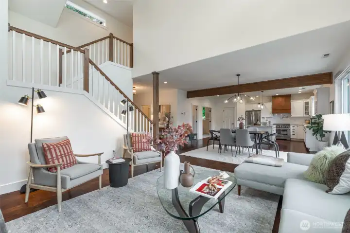 The inviting great room showcases a two-chef granite kitchen, cozy gas fireplace