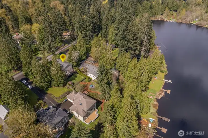 LAKE LIVING at its finest in this exceptional custom NW Craftsman,  thoughtfully refreshed home with new carpet, fresh paint, and stylish lighting is a rare turnkey waterfront opportunity