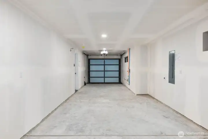 2 car garage with electric charging capabilities.