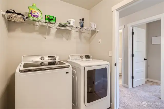 Utility room upstairs for easy laundry service!
