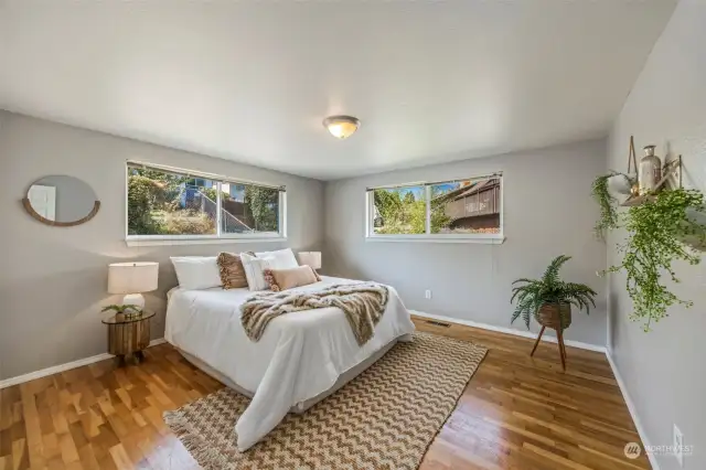 Main level bedroom with hardwood floors