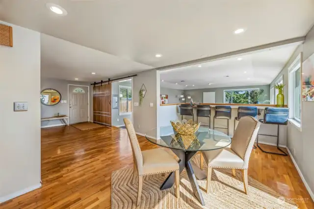 Dining room with access through slider to expansive deck