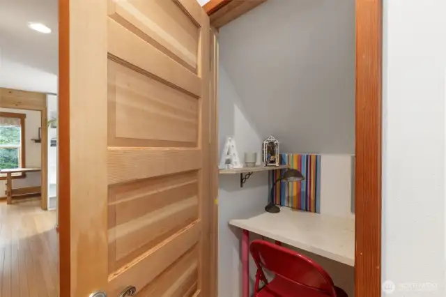 Upstairs closet has been coverted to an adorable office for one of their children.