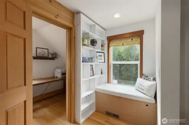 Window seat reading nook with storage, to left is a perfect home office!
