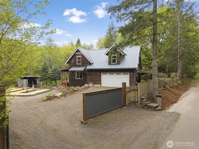 Gated entry, 2 car garage and carport.