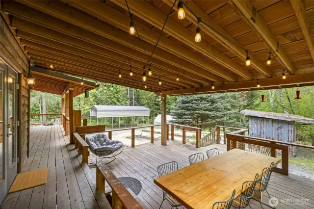 Amazing covered back deck is great for entertaining.