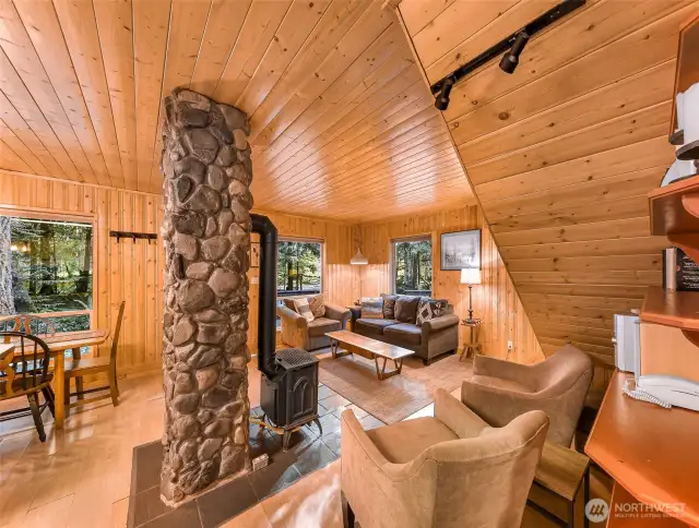 Entertaining space centered around this beautiful rock wall and fireplace