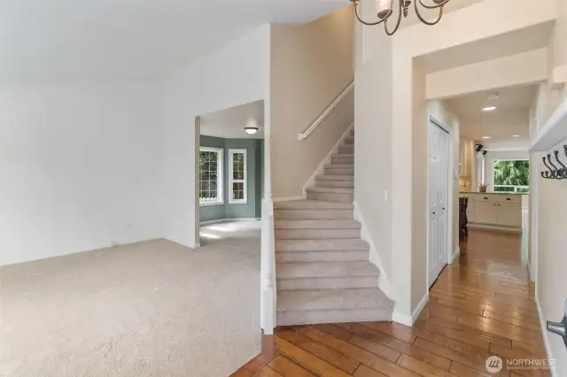 Back to the entry, as we head up the stairs we find vaulted ceilings and an open feel.