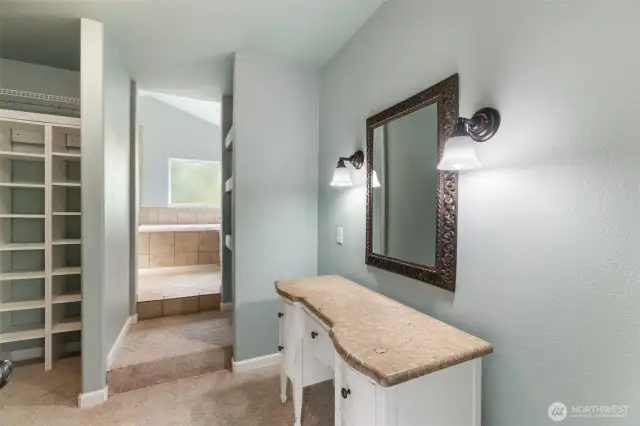 Jerusalem limestone topped table, built in shelving, adjacent to walk in closet space. The perfect spot to get ready for the day!