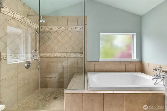 Tile shower, soaking tub, and did we mentioned HEATED floors?!