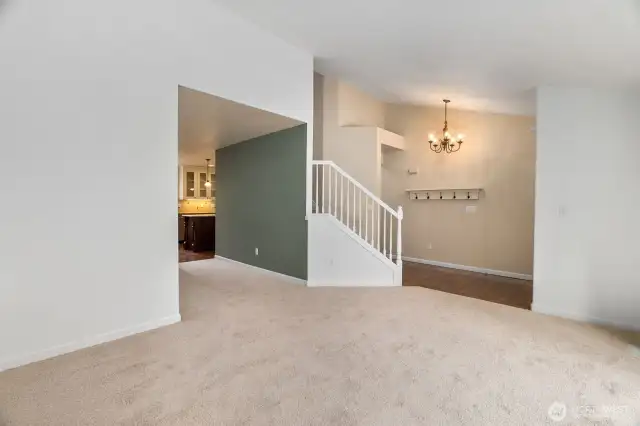 Vaulted ceilings make for a large entry way