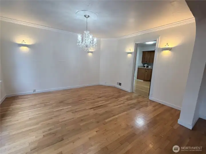 Dining room leads into kitchen.