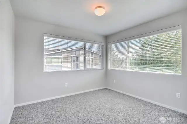 Additional bedroom with incredible windows and light!  You've got to see this in person to really soak it in.