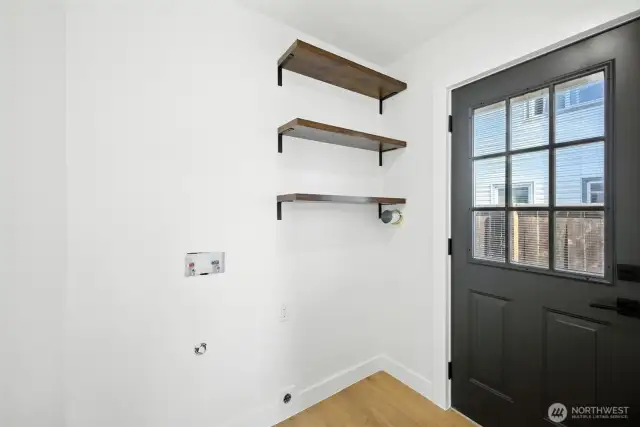 Utility room, ready for buyer to install a top-bottom W/D.