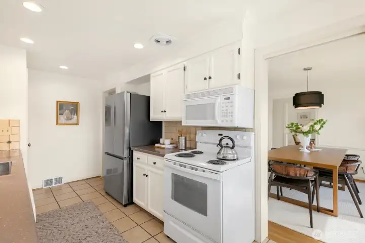 Kitchen is light and bright and has a brand new fridge!