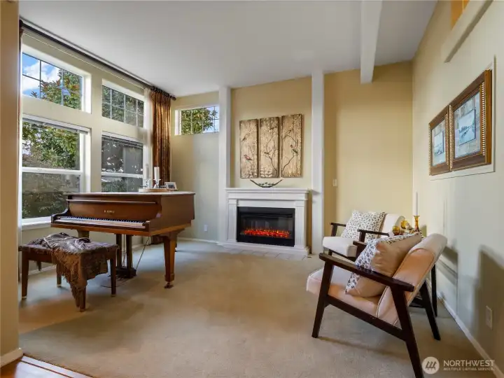 The grand piano is no the only thing grand about this home. Large majestic windows and architectural details adds to the high-end feel of this tripple wide.