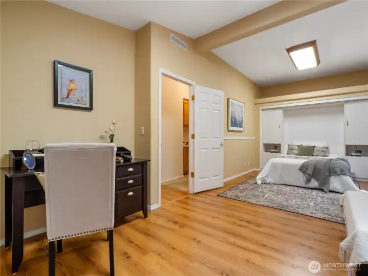 The vaulted ceiling gives this bonus sized room a lofty feel.