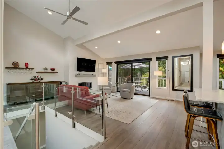 Open-concept living space. Stairs down to the lower-level.