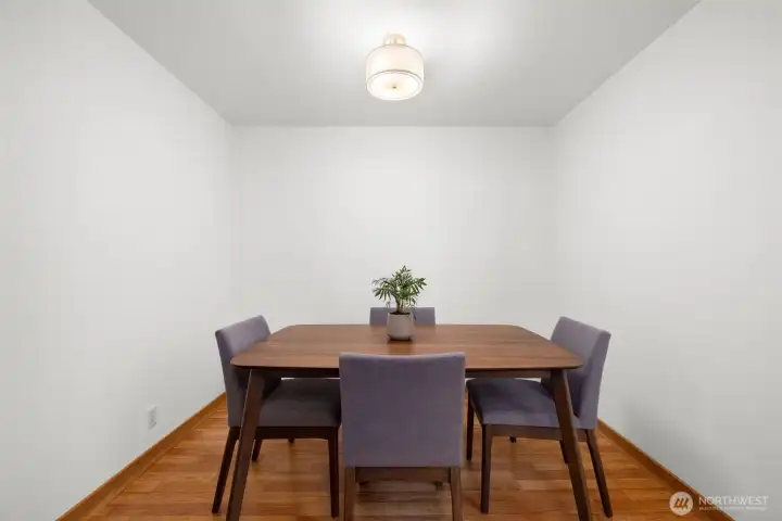 Intimate dining space made for hosting cozy dinners and long conversations.