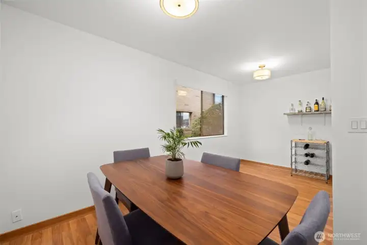 Gather around the table—this warm dining area is perfect for everyday meals and special moments.